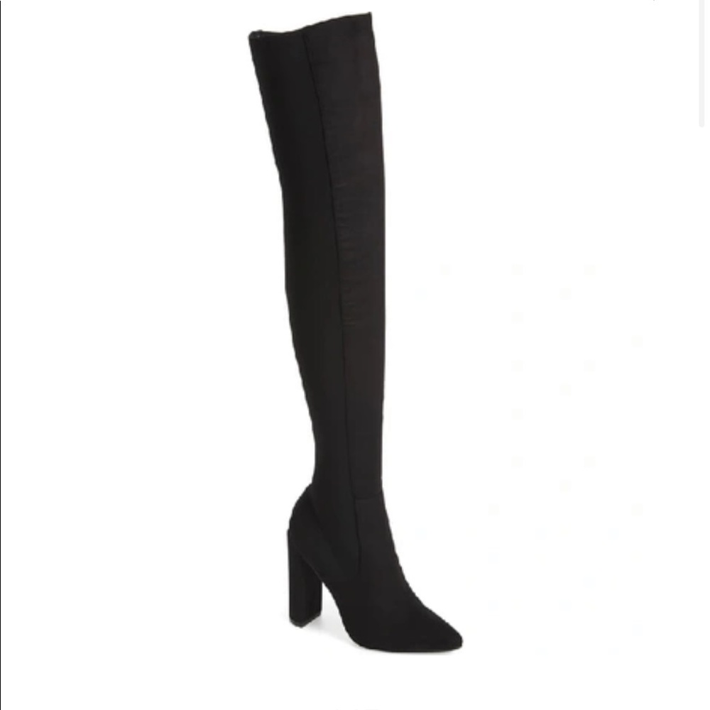 Knee high black boots.